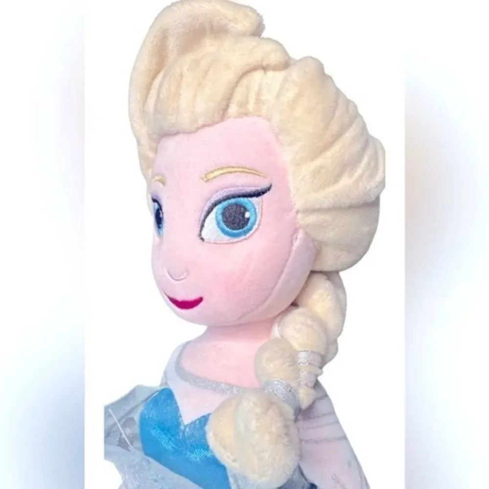 Disney Elsa plush doll. Never used… like new. 24” tall.